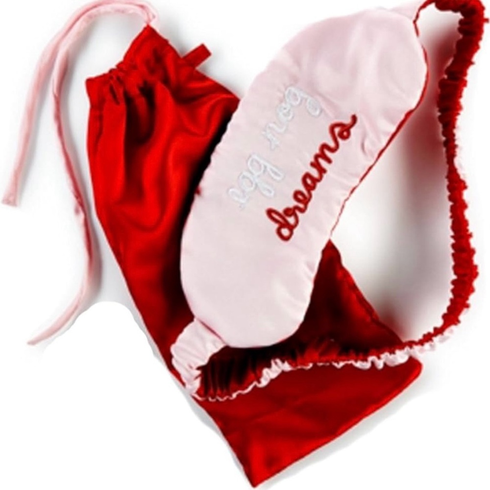 TwelveNYC Egg Nog Dreams Night Sleep Mask with a matching pouch.